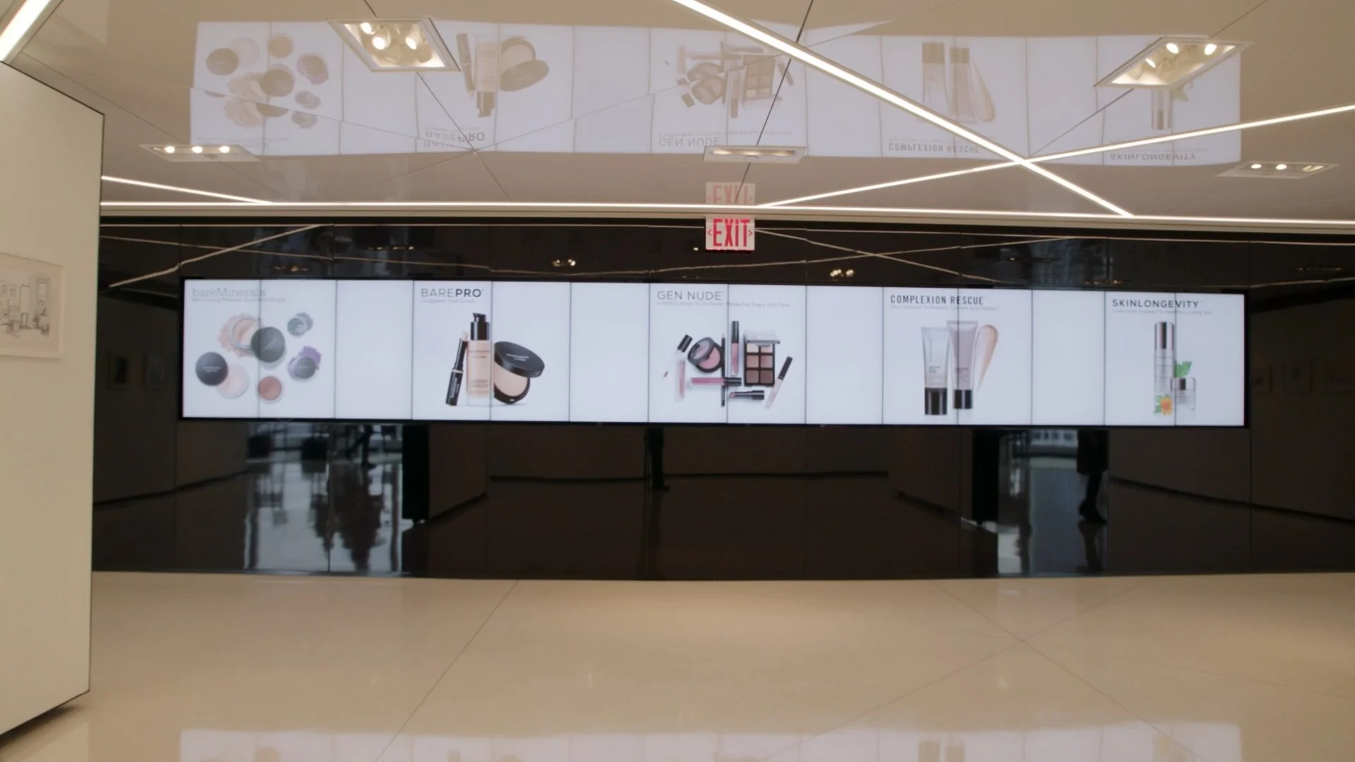 Display of bareMinerals products including foundations and skincare.